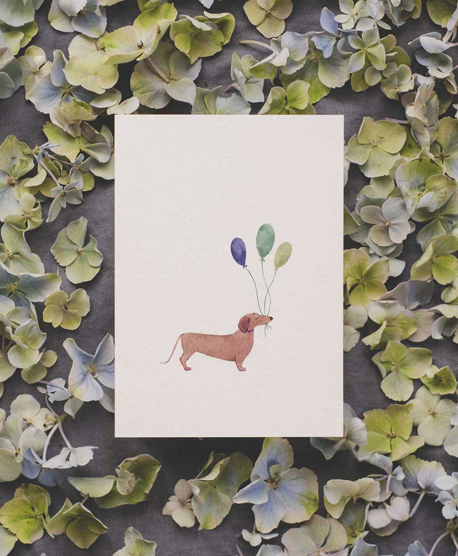 Postkarte "Dackel mit Luftballons"